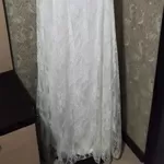 Платье белого цвета длинное