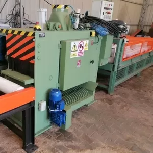 Многопильная линия для раскроя с центрирующим столом и выгрузкой досок